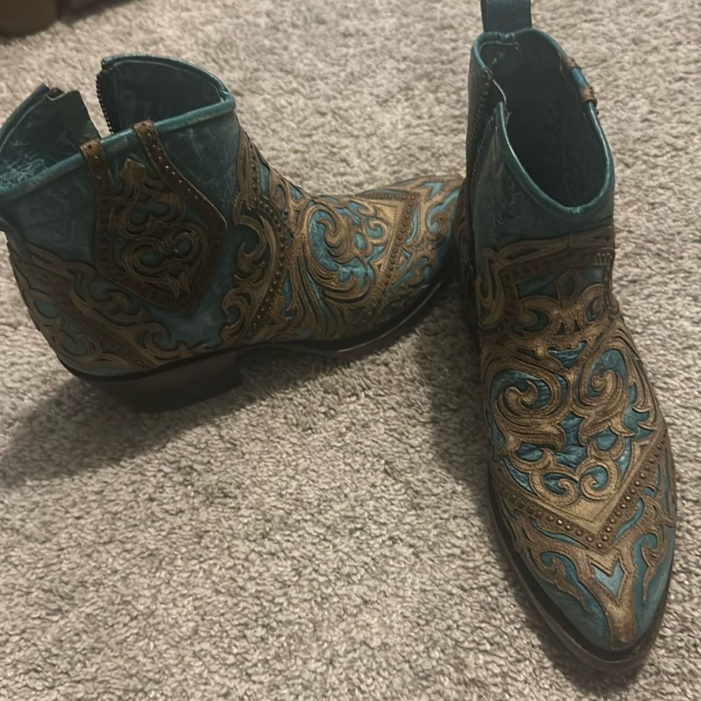 Turquoise and tan  leather half boots.